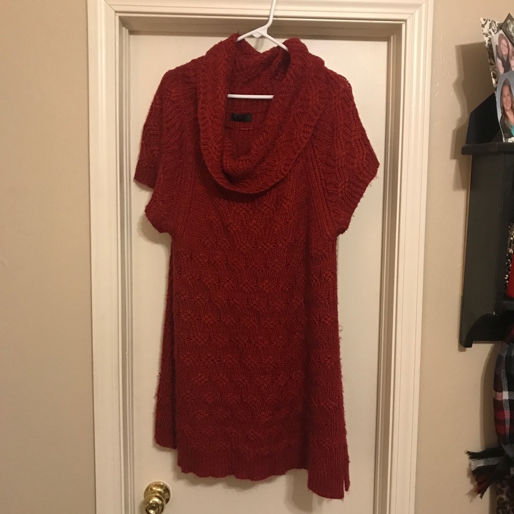 Sweater dress goes great with leggings .